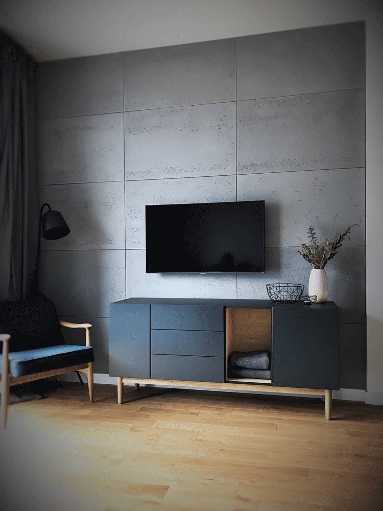 beton-architektoniczny-sciana-z-tv-1 beton w salonie z drewnianą podlogą